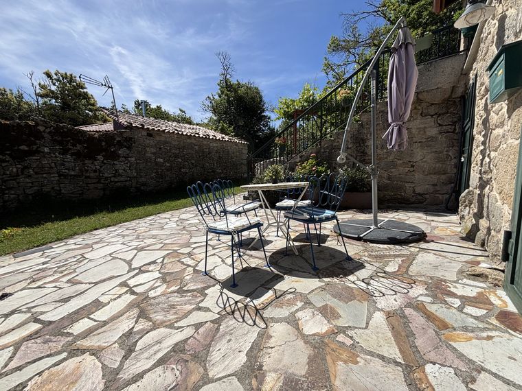 Pati i terrassa exterior · A Casita do Ferreiro